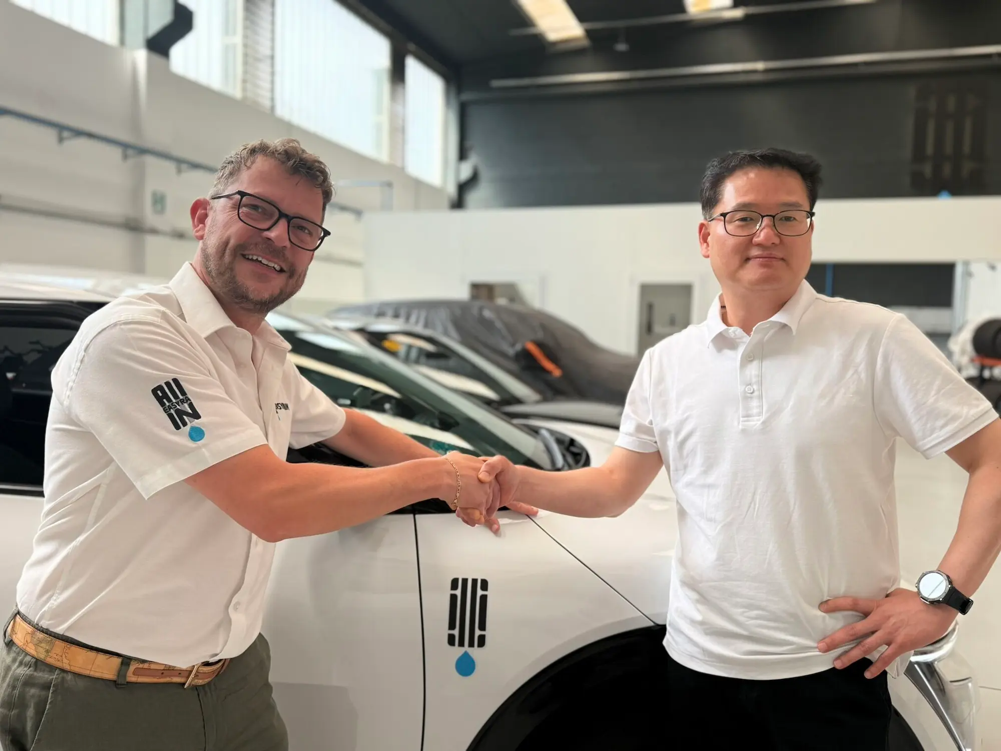 Easyrain and Hyundai logos symbolizing their 4-year partnership for vehicle safety.